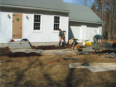 The Hilltown Garden & Tree crew installing local Goshen flagstone at a Chesterfield, MA home.
