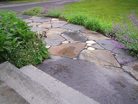 Ornamental and practical, this flagstone walkway Jim McSweeney installed for a Chesterfield, MA client shows both the quality of his work and how it really add to the country feel of a home.