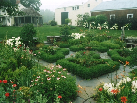 Here the Worthington, MA formal garden sits in balanced, pleasing harmony with the rest of the estate.
